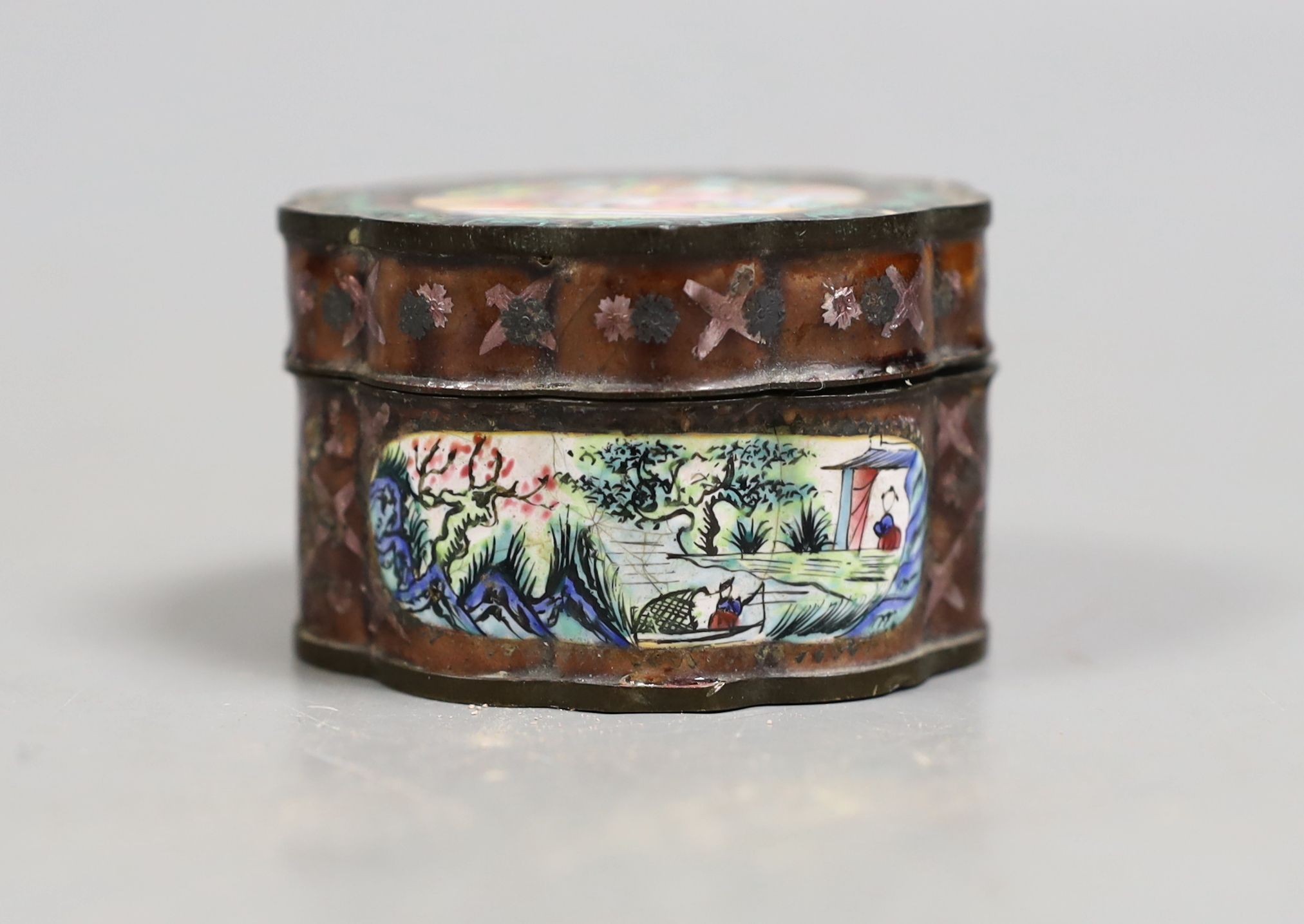 A 19th century Chinese Canton enamel box and cover, 5.5 cms diameter.